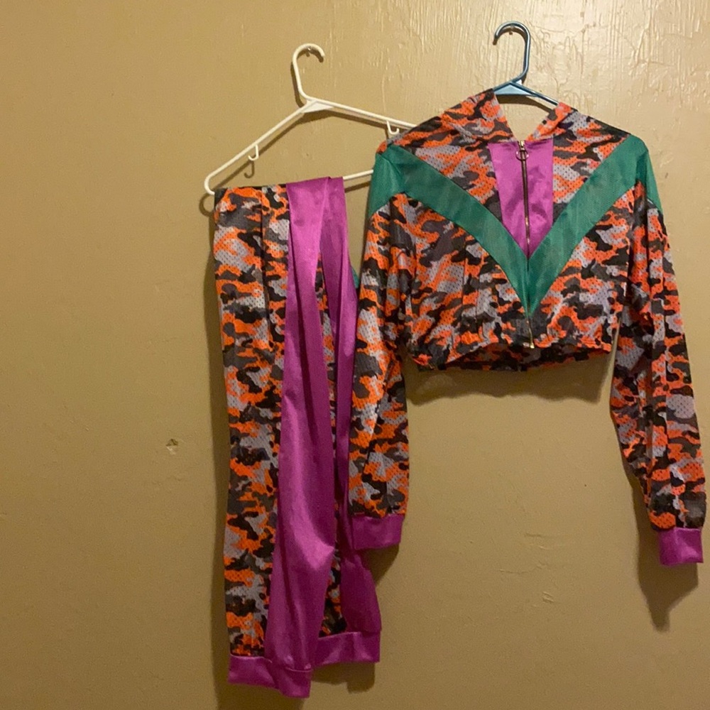 Jumpsuit very nice, size large, see through.